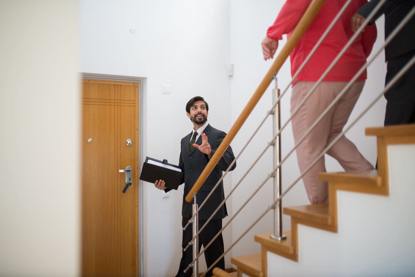 A Harbour Ridge agent walking buyers through a house